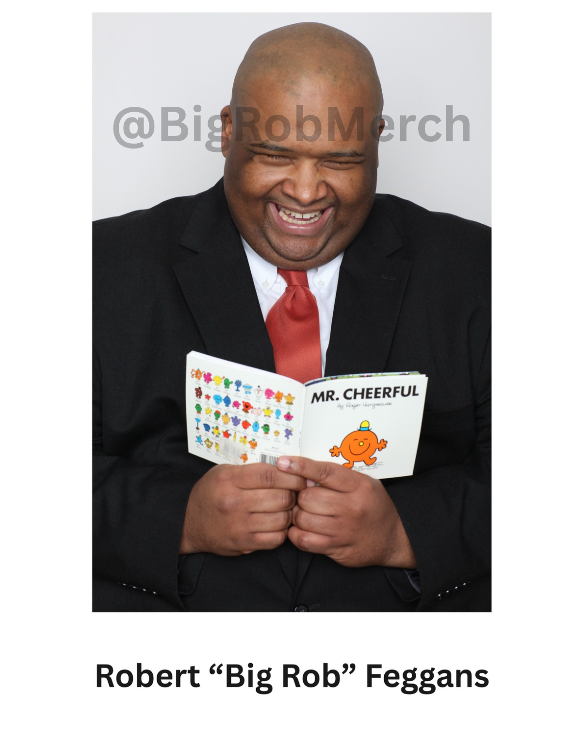 Autographed color photo of Big Rob with Mr Cheerful Book, Looking Down and Smiling